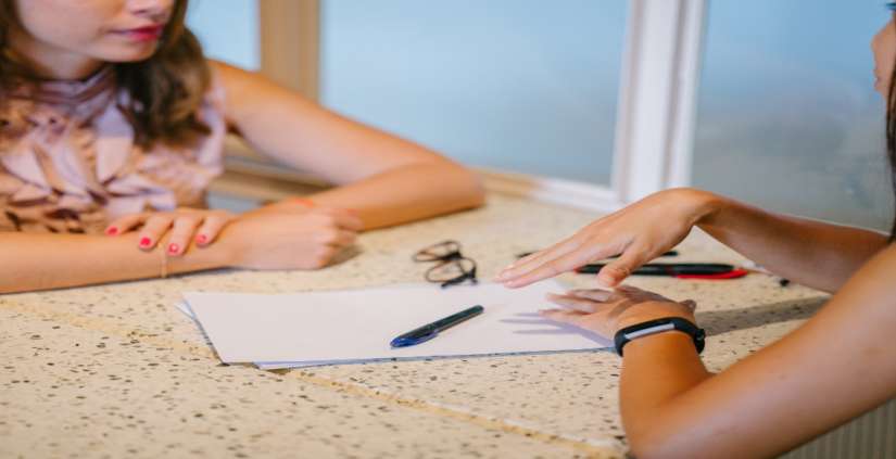 Two women communicating