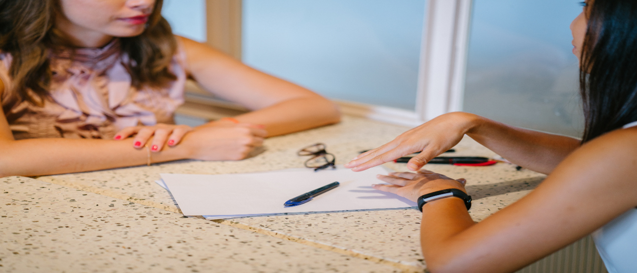 Two women communicating