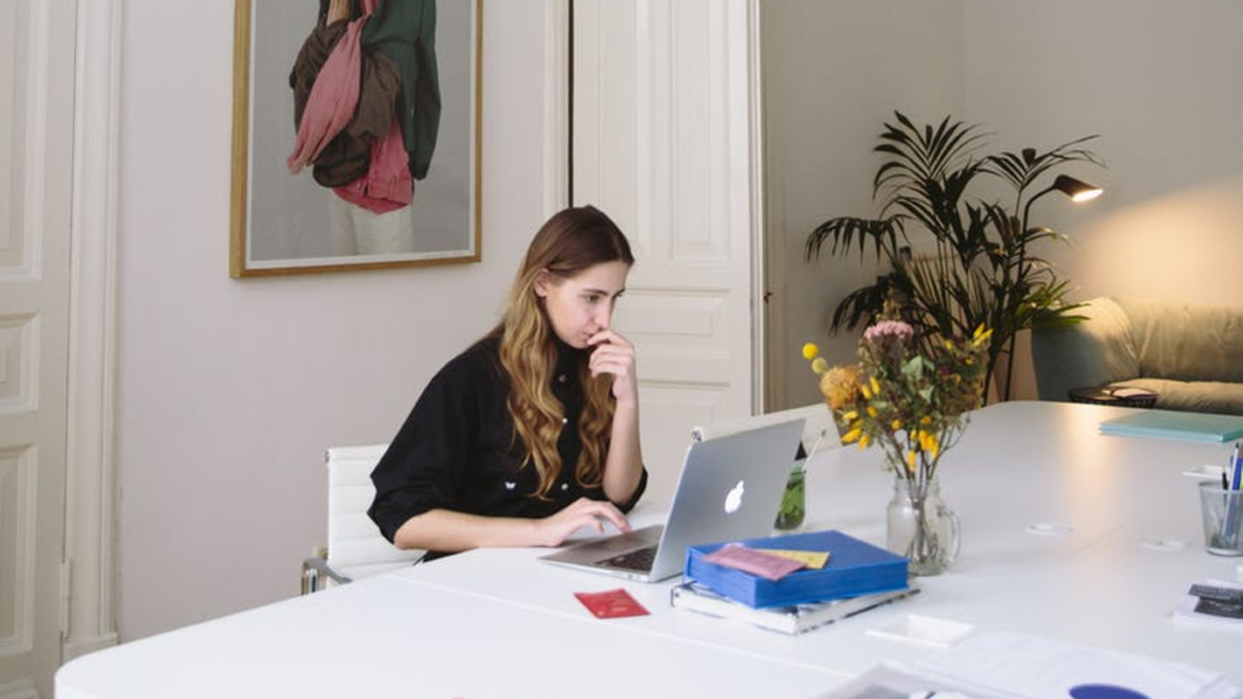 Girl working from home on a laptop