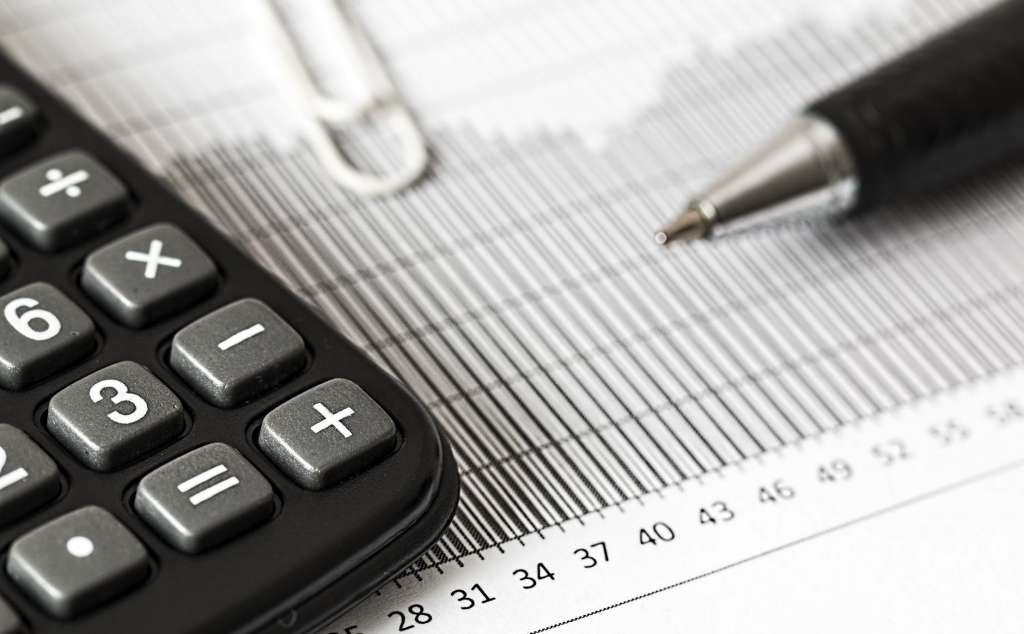 Pen and calculator for cutting costs