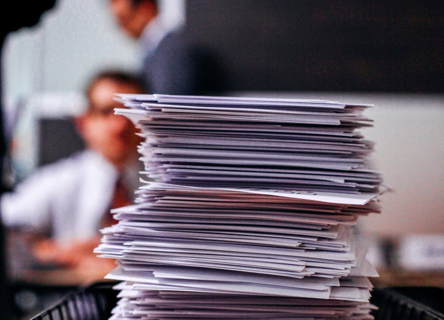 Piles of paper in office