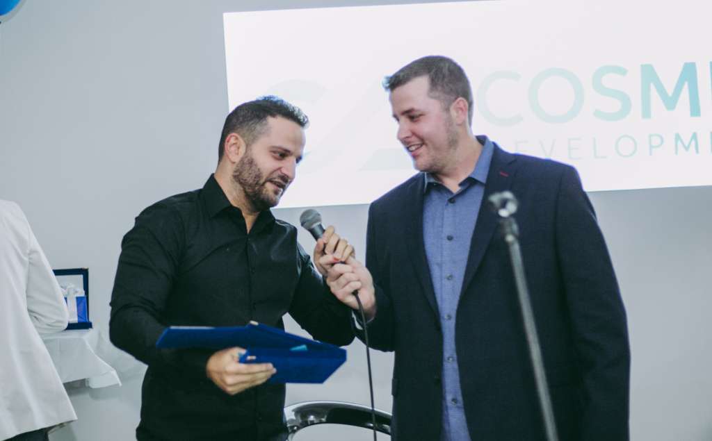 Rumble's Content Editor receiving an award at Cosmic Development