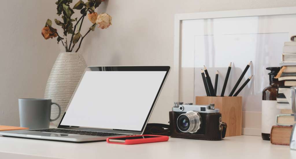 laptop and camera and using video marketing tools