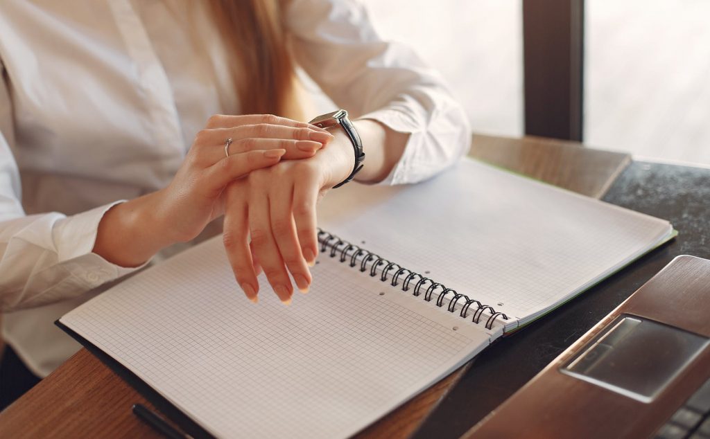 Woman practicing time management skills