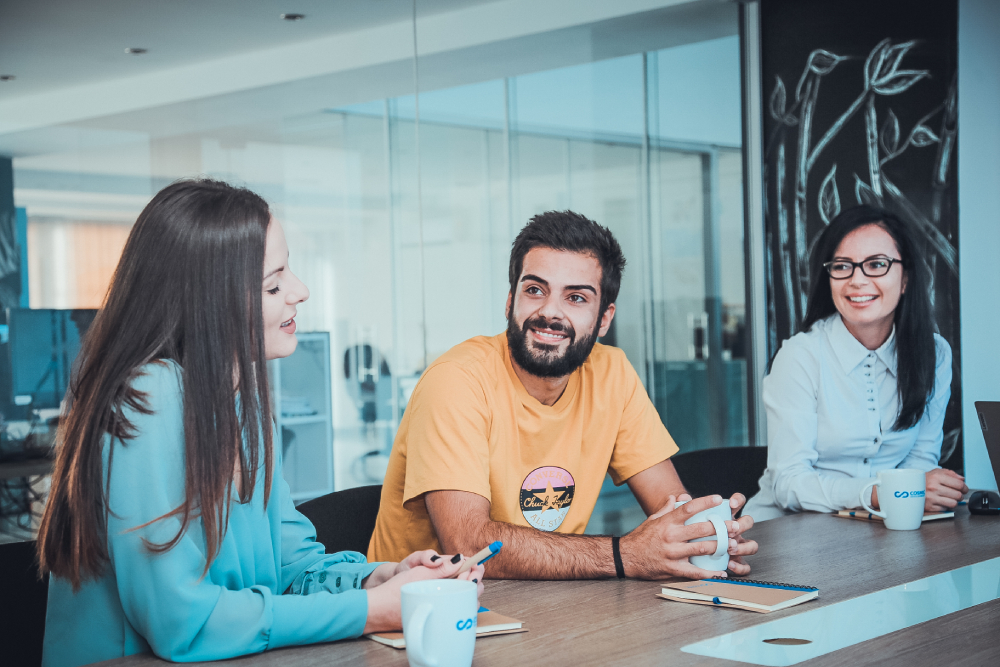 Dedicated team working at Cosmic Development. Employees at the office.